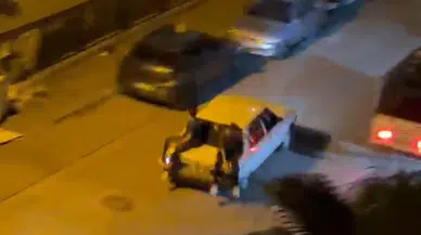Bagajda seyir eden genç ani frenle asfalta savruldu: Son anda aracın altına girmekten kurtuldu