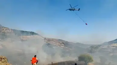 Nazımiye'de ormanlık alanda alevlerle mücadele: Helikopter desteği sağlandı