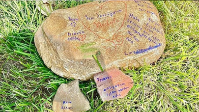 "Tecavüz ediliyorum" yazılı taş, polisi alarma geçirdi