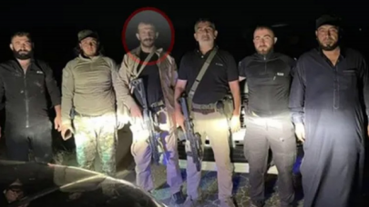 Suriye'de silahla poz veren MHP'li ilçe başkanı görevinden istifa etti