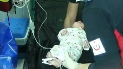 Mezarlıkta toprağa gömülmüş canlı bebek bulundu