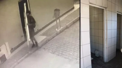 Caminin tuvalet kapılarını çaldı, omzunda götürdü