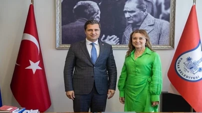 Deniz Yücel’den Başkan Mutlu’ya tebrik ziyareti