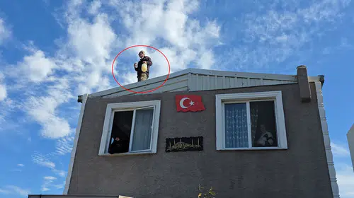 Mudanya'da yıkım gerilimi: Çatıya çıkıp benzinle tehdit etti