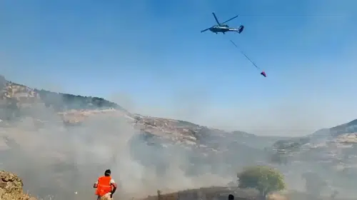Nazımiye'de ormanlık alanda alevlerle mücadele: Helikopter desteği sağlandı