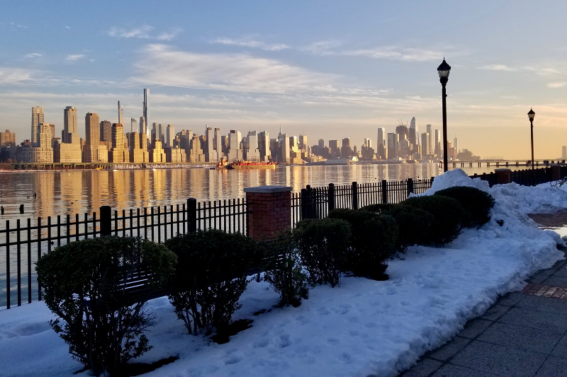 New York'ta kar ve gün batımı