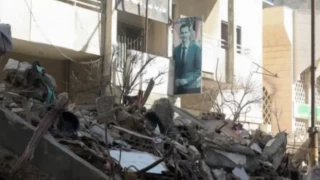 Esad, depremden etkilenen Halep'e gitti