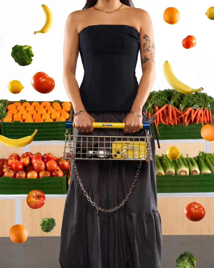 Woman holding bag with Lidl branding